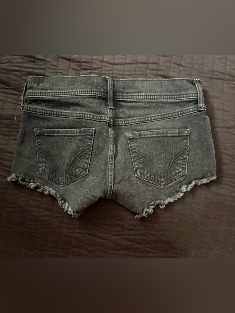 Low-Waist Black Denim Women’s Jeans with Frayed bottoms